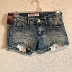 Jean shorts with lace pocket detail